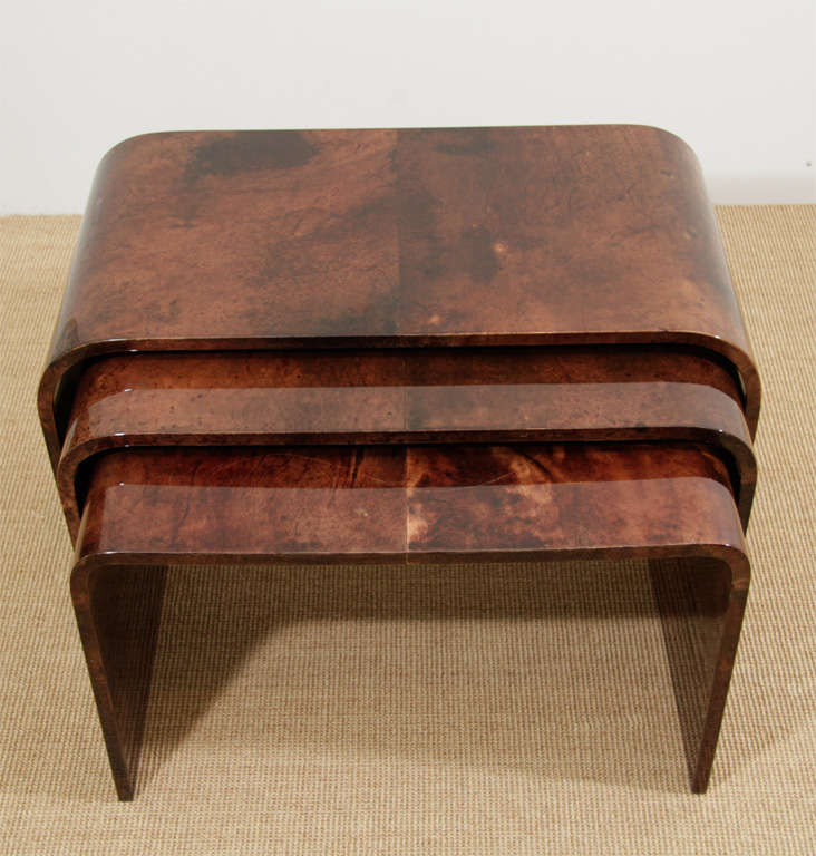 An Aldo Tura set of Lacquered Parchment Nesting Tables.